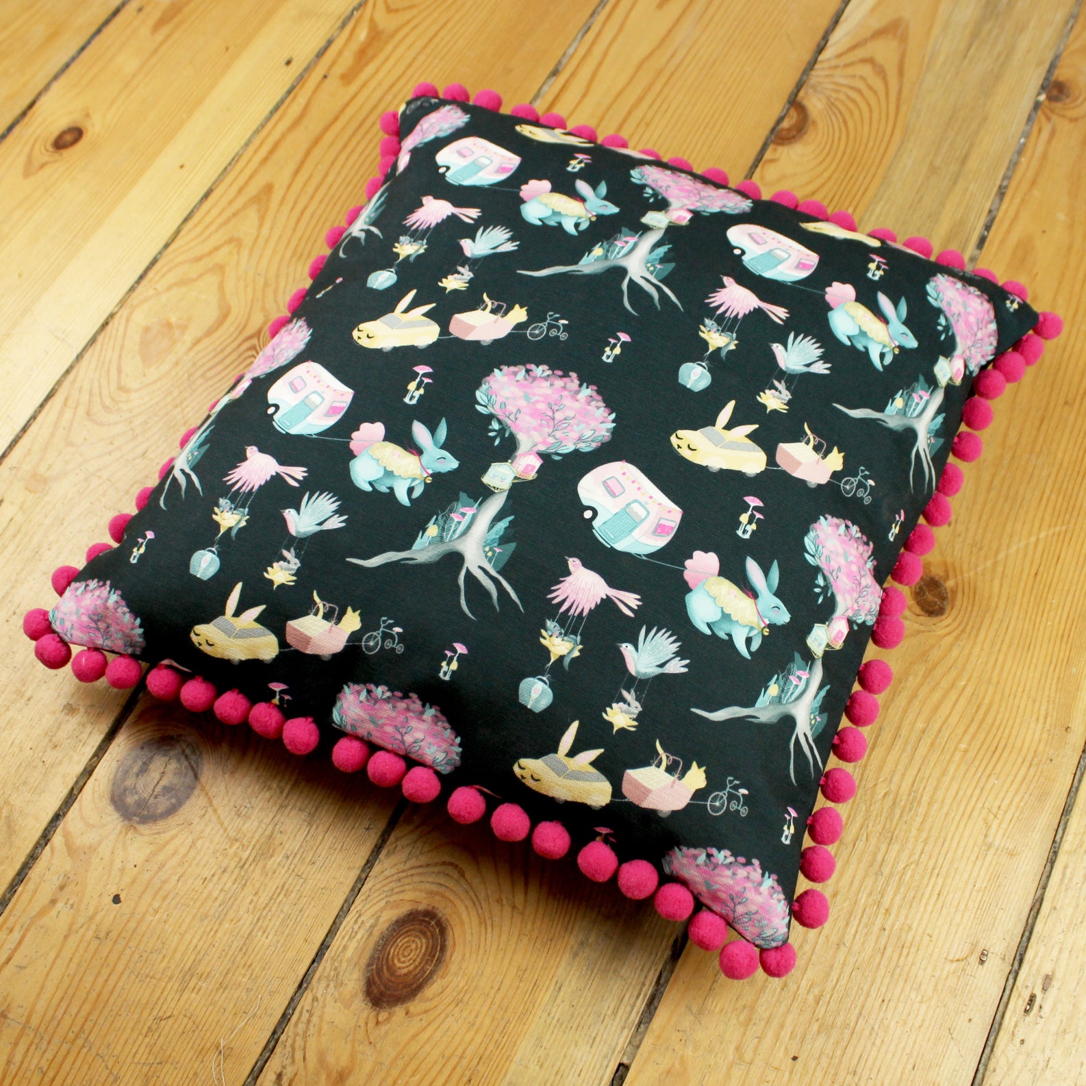 END OF LINE SALE Dark Blue Bunnyville Biscuit Cushion Cover with Pink Pom Pom Trim